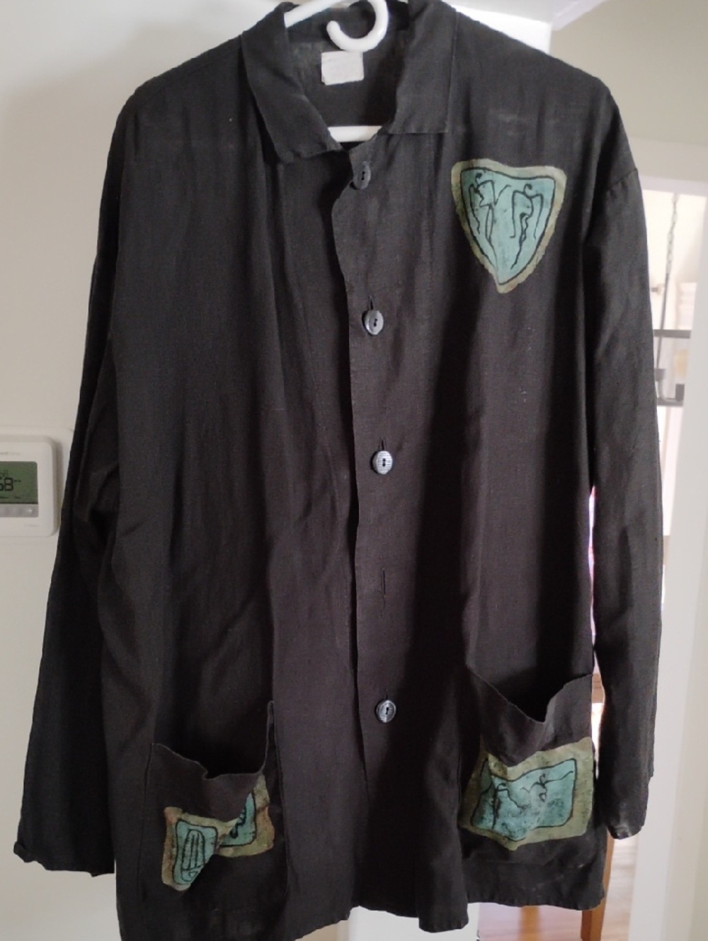 Black Button-Down Women's Shirt with Green Patch Accents